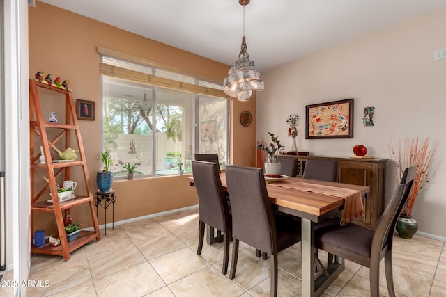 5083 W Buckskin Dr, Eloy, AZ 85131 - dining room featuring baseboards and visible vents