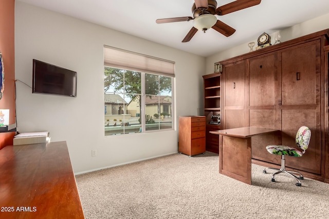 5083 W Buckskin Dr, Eloy, AZ 85131 - office space featuring a ceiling fan, light carpet, and baseboards