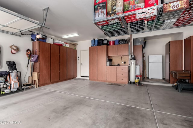 5083 W Buckskin Dr, Eloy, AZ 85131 - garage with freestanding refrigerator