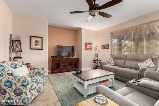 5083 W Buckskin Dr, Eloy, AZ 85131 - living room with baseboards, ceiling fan, and light tile patterned floors