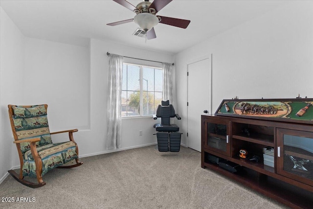 sitting room with light carpet and ceiling fan