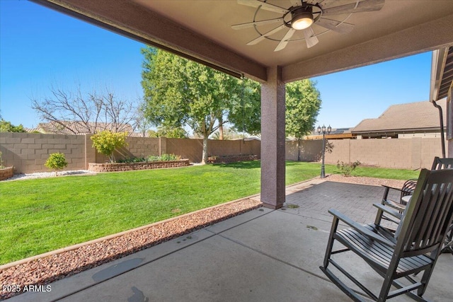 view of patio / terrace featuring ceiling fan