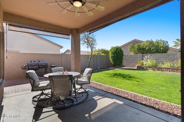 view of patio featuring ceiling fan