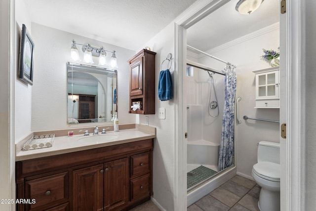 bathroom featuring vanity, tile patterned floors, toilet, and walk in shower