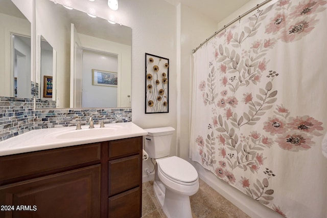 bathroom featuring decorative backsplash, tile patterned floors, vanity, and toilet