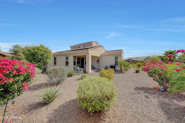 view of front of home with a patio