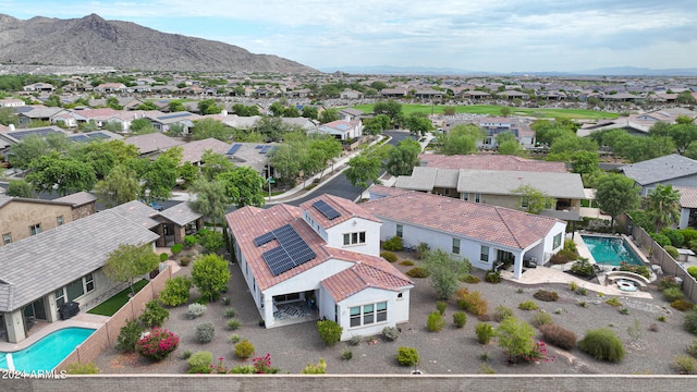 drone / aerial view featuring a mountain view