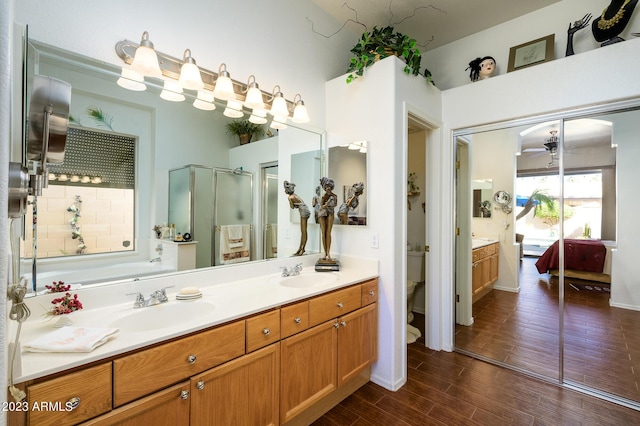 316 W Anderson Ave, Phoenix, AZ 85023 - full bathroom with double vanity, ensuite bath, a bath, a stall shower, and a ceiling fan