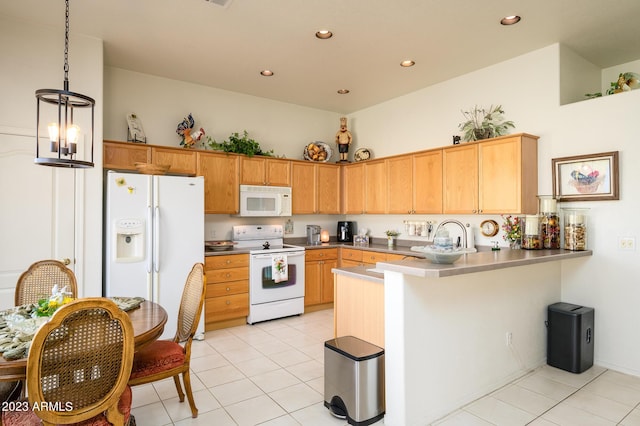 316 W Anderson Ave, Phoenix, AZ 85023 - kitchen with white appliances, light tile patterned floors, a peninsula, recessed lighting, and decorative light fixtures