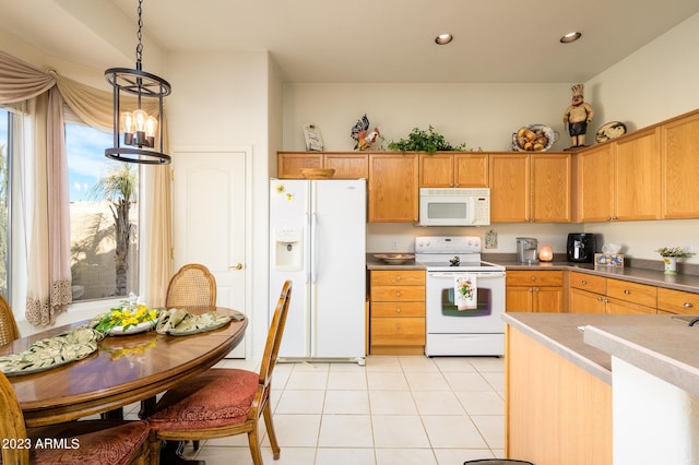 316 W Anderson Ave, Phoenix, AZ 85023 - kitchen with white appliances, hanging light fixtures, light tile patterned floors, and recessed lighting