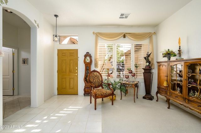 316 W Anderson Ave, Phoenix, AZ 85023 - foyer entrance with arched walkways and light tile patterned floors