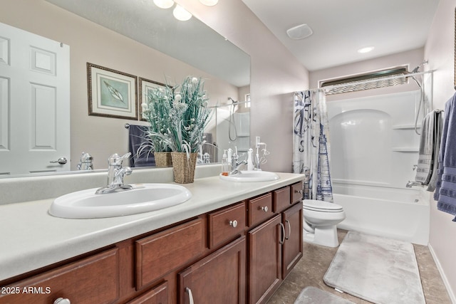 full bathroom with vanity, shower / bath combination with curtain, and toilet