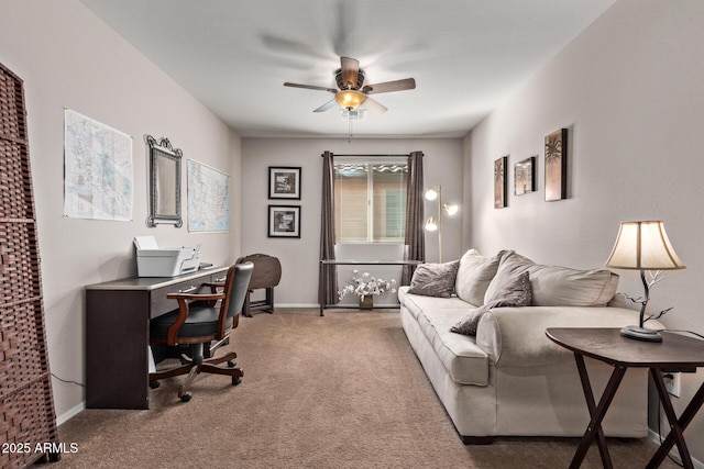 carpeted home office with ceiling fan