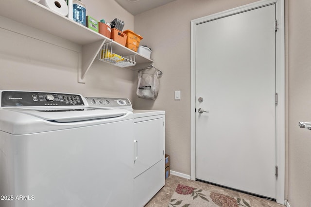 laundry area with independent washer and dryer