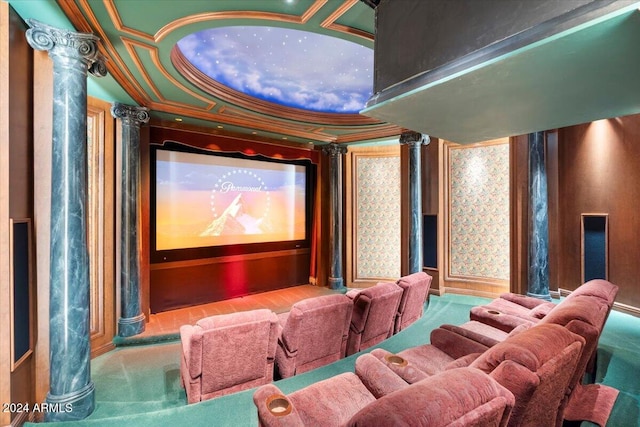 home theater room featuring ornate columns