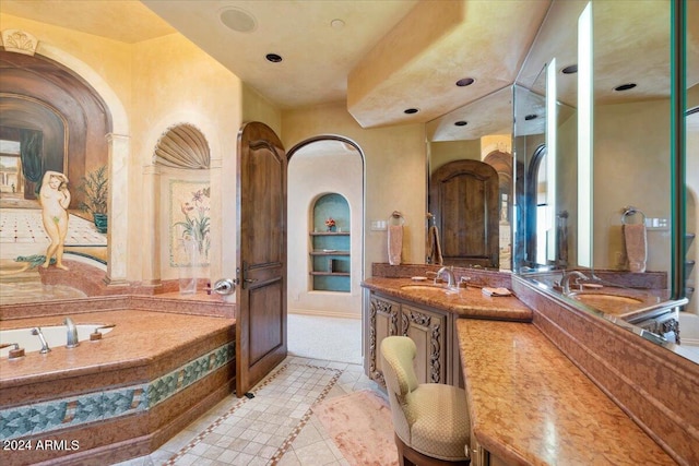 bathroom with vanity, built in shelves, and tile patterned floors