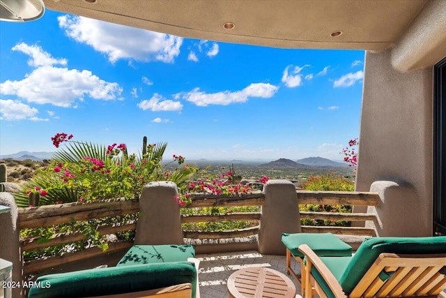 balcony featuring a mountain view