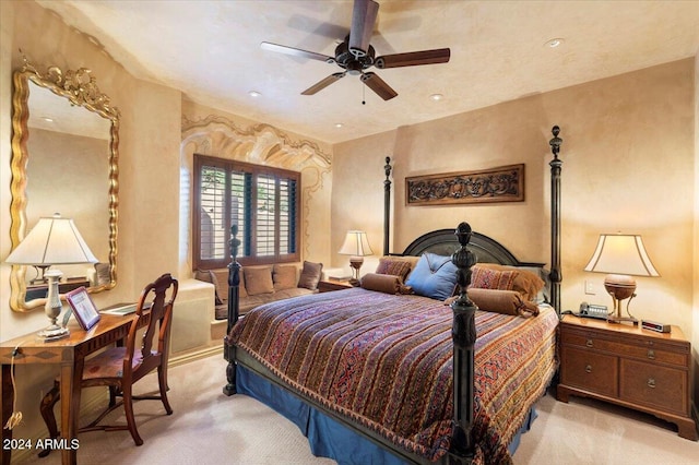 carpeted bedroom featuring ceiling fan