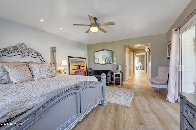 bedroom featuring ceiling fan and light wood-type flooring