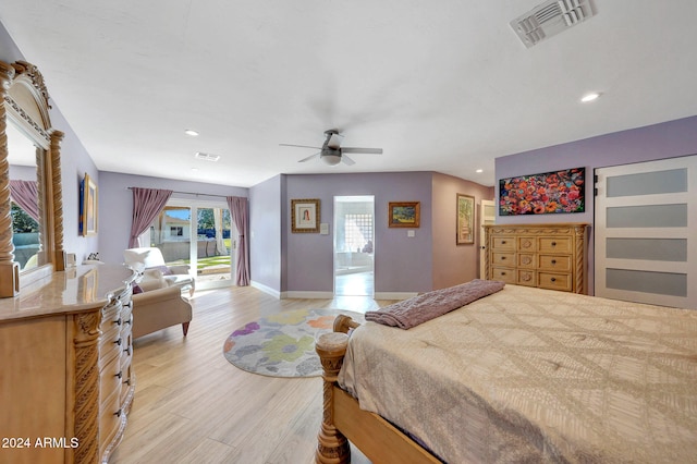 bedroom featuring ceiling fan and light hardwood / wood-style flooring