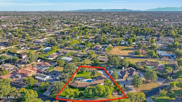 birds eye view of property featuring a mountain view