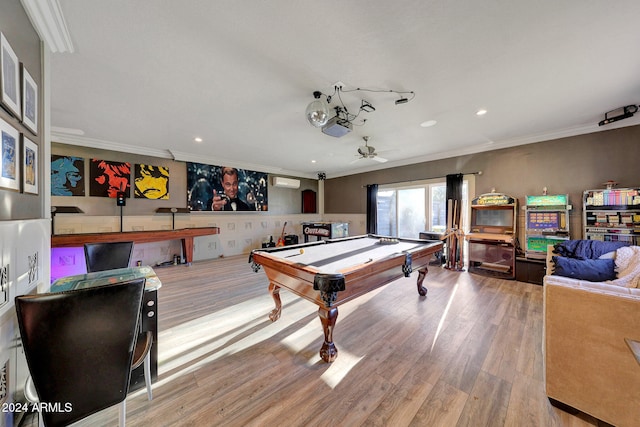 game room with light wood-type flooring, pool table, ceiling fan, and crown molding