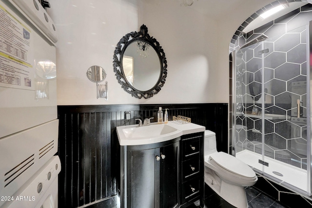 bathroom with tile patterned flooring, toilet, an enclosed shower, and sink