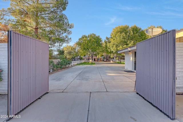 view of gate with a patio area