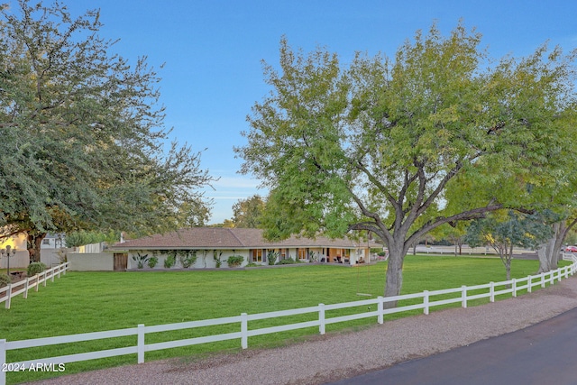 view of front of home with a front yard