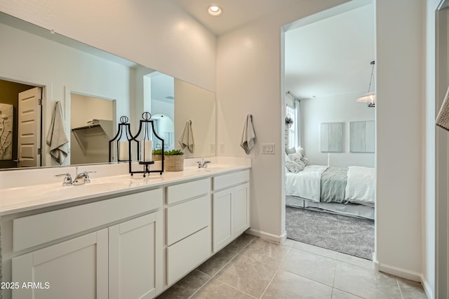 bathroom featuring vanity and tile patterned flooring