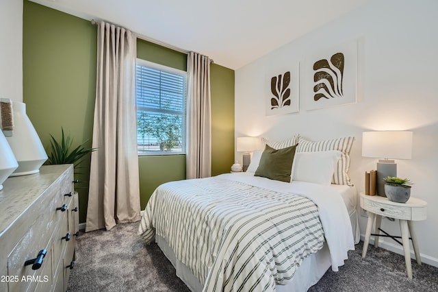 bedroom featuring dark colored carpet