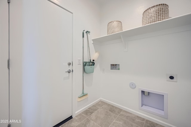 clothes washing area with electric dryer hookup, light tile patterned floors, hookup for a washing machine, and gas dryer hookup