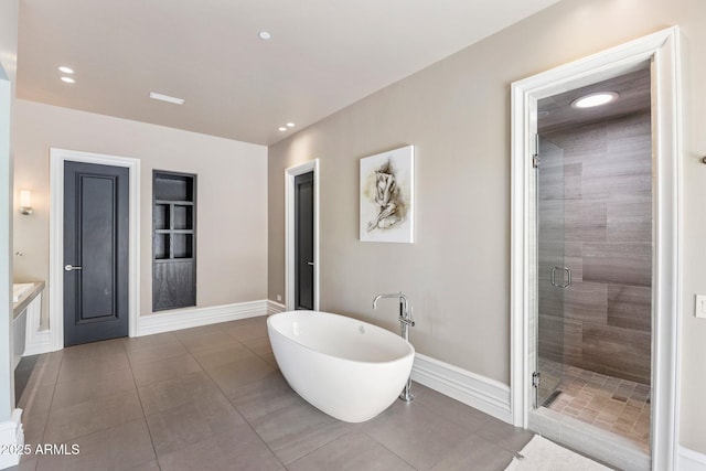26099 N 88th Way, Scottsdale, AZ 85255 - bathroom featuring tile patterned floors, baseboards, a stall shower, and a freestanding bath