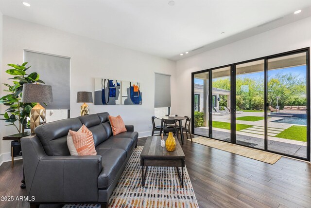 26099 N 88th Way, Scottsdale, AZ 85255 - living room featuring recessed lighting, wood finished floors, and baseboards