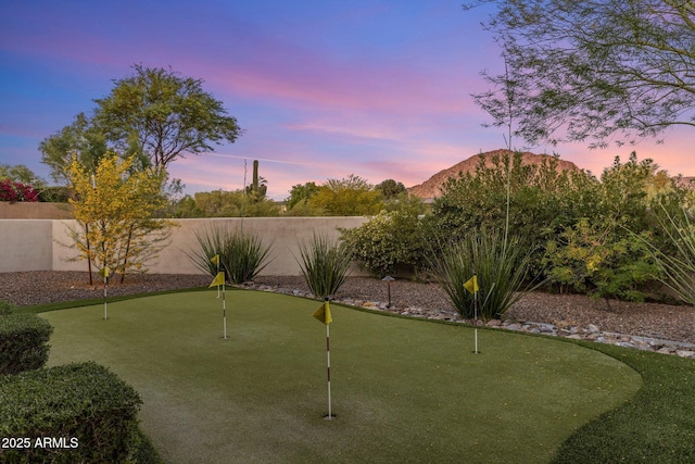 26099 N 88th Way, Scottsdale, AZ 85255 - yard at dusk featuring a mountain view and a fenced backyard