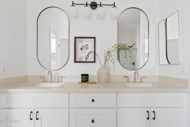 bathroom with vanity and a wealth of natural light