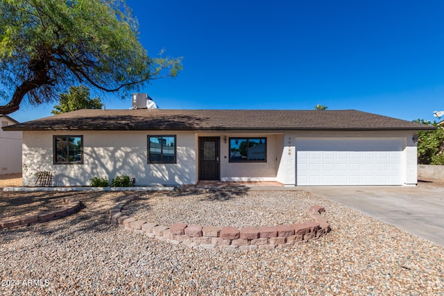 single story home with a garage