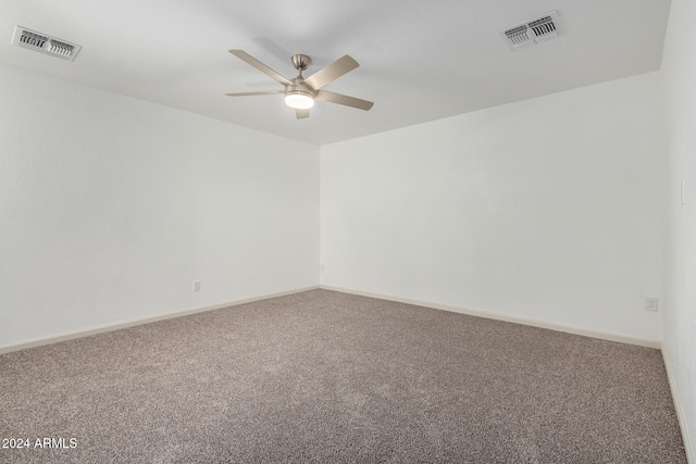 carpeted empty room with ceiling fan