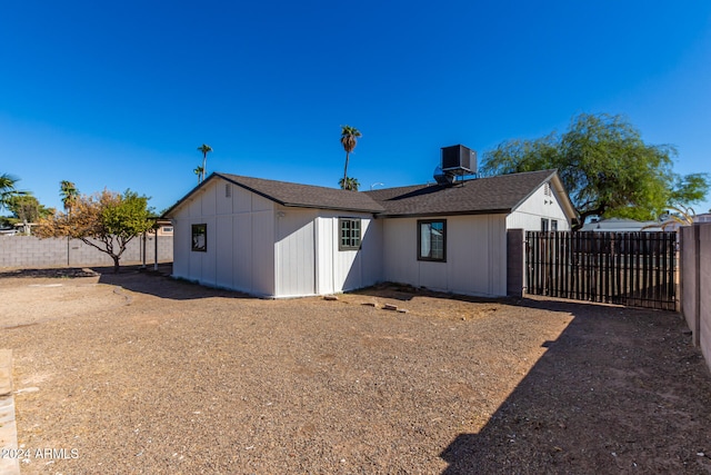 back of property with central AC unit