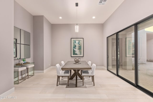 dining room featuring light hardwood / wood-style flooring