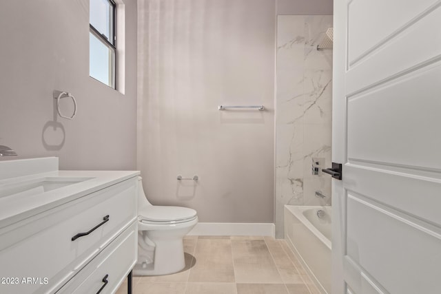 full bathroom featuring tile patterned floors, vanity, tiled shower / bath combo, and toilet