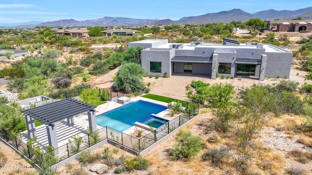 view of pool with a mountain view, a pergola, and a patio area