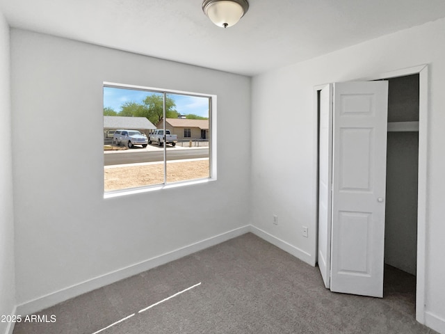 5308 N 77th Dr, Glendale, AZ 85303 - unfurnished bedroom featuring carpet floors and baseboards