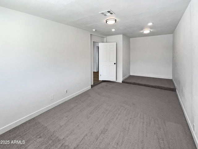 5308 N 77th Dr, Glendale, AZ 85303 - empty room with baseboards, visible vents, and carpet flooring