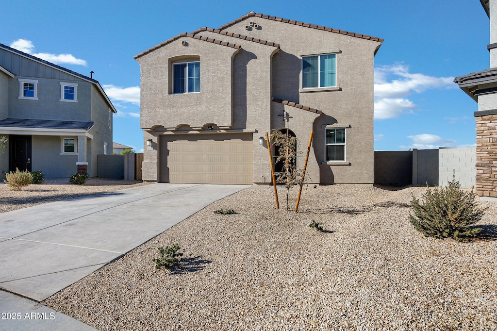 view of front of property with a garage