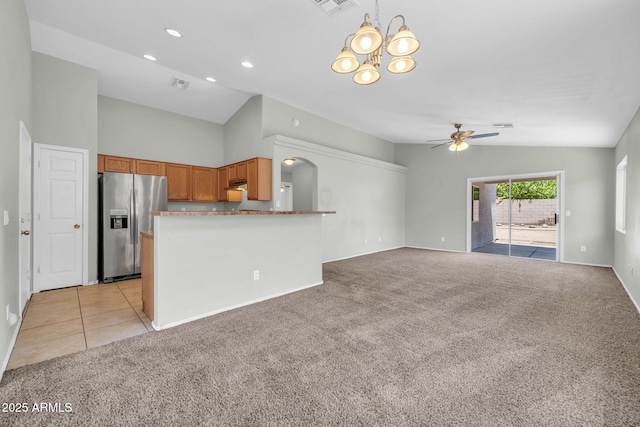 11154 W Ashley Chantil Dr, Surprise, AZ 85378 - unfurnished living room featuring lofted ceiling, light colored carpet, ceiling fan, a chandelier, and recessed lighting