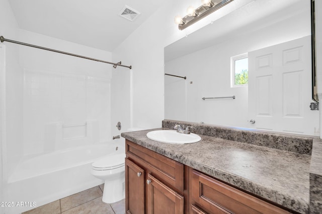 11154 W Ashley Chantil Dr, Surprise, AZ 85378 - bathroom with vanity, toilet, tile patterned floors, and bathtub / shower combination
