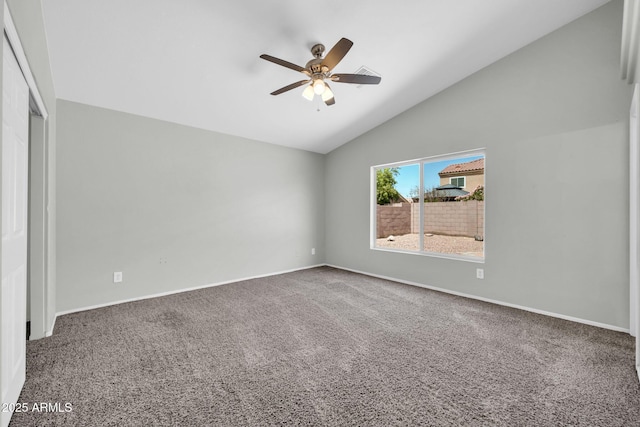 11154 W Ashley Chantil Dr, Surprise, AZ 85378 - empty room with carpet flooring, a ceiling fan, baseboards, and high vaulted ceiling