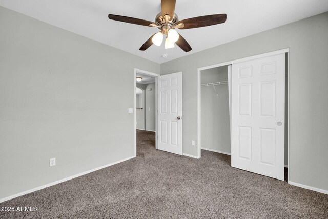 11154 W Ashley Chantil Dr, Surprise, AZ 85378 - unfurnished bedroom featuring carpet floors, baseboards, a closet, and a ceiling fan