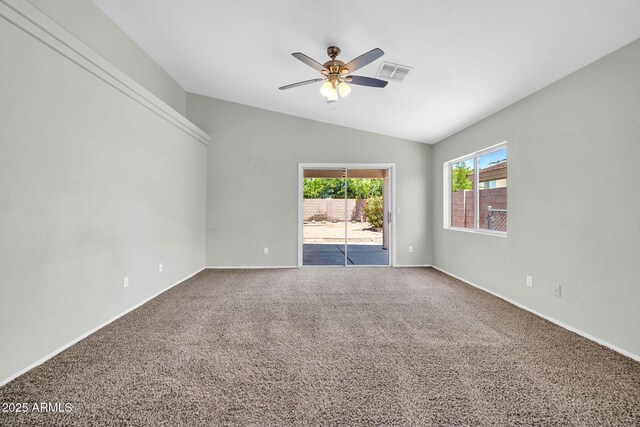11154 W Ashley Chantil Dr, Surprise, AZ 85378 - carpeted spare room with vaulted ceiling, a ceiling fan, and baseboards